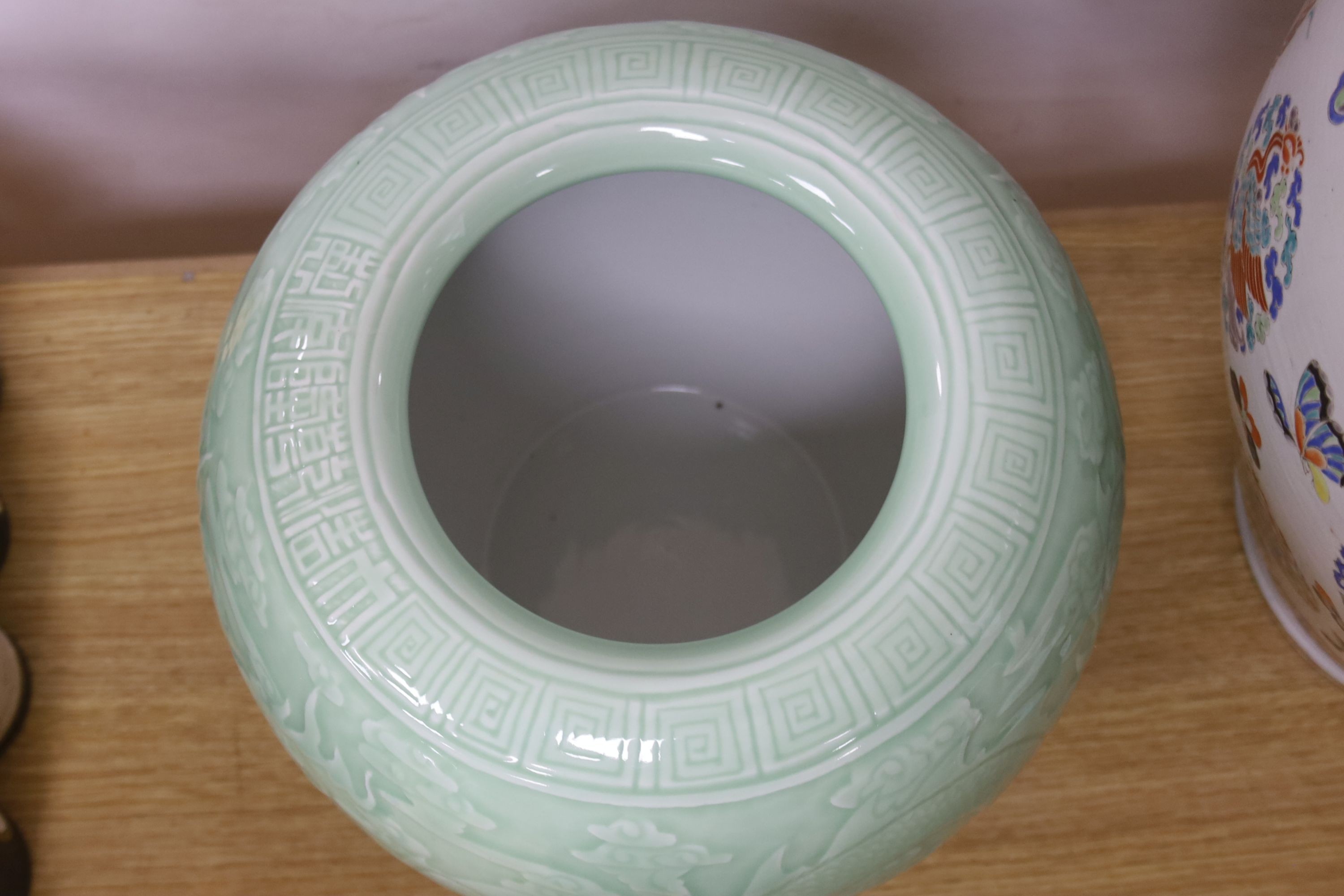 A large Chinese celadon glazed 'dragon' jardiniere or fish bowl 29cm